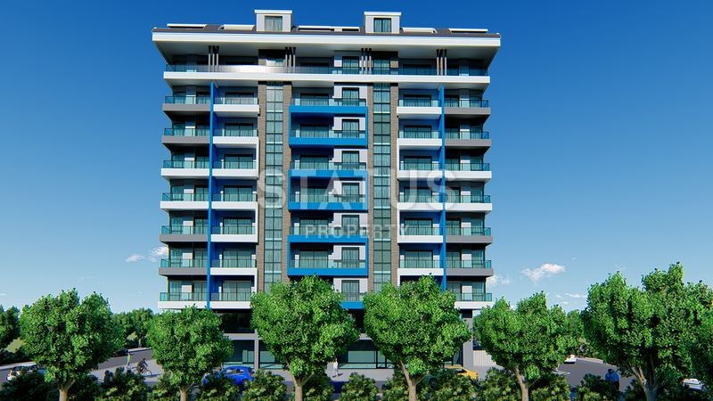 Апартаменты 1+1 и 2+1 в комплексе на стадии котлована в Махмутларе. фото 1